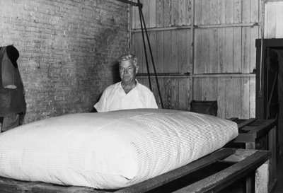Employee working in the Chattahoochee mattress factory in the 1960s