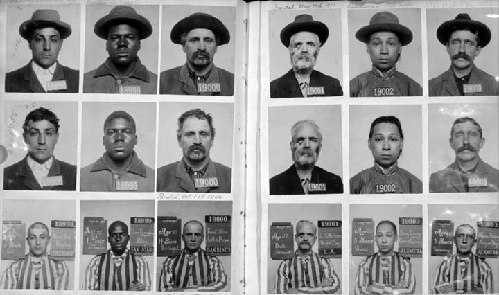 An open historical album showing rows of identification photographs of men